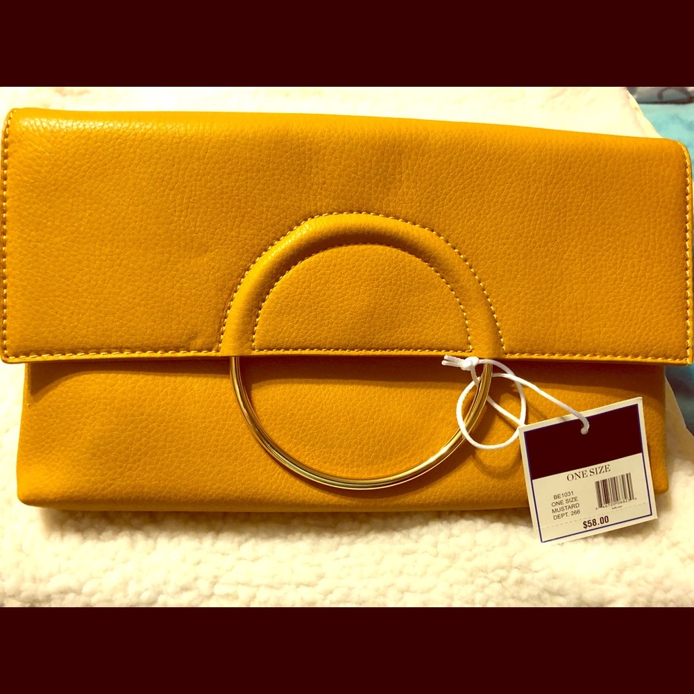 Kari Blue clutch new with tags.